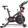 Schwinn IC4 Indoor Cycling Bike with 100 Resistance Levels, Bluetooth Heart Rate Armband, Dual-Sided SPD Pedals, Compatible with Peloton App, Zwift